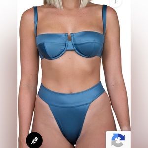 Bathing suit set by House of Zz. New with tags & original packaging,never used.